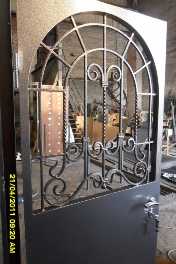 Дверь с ковкой цена