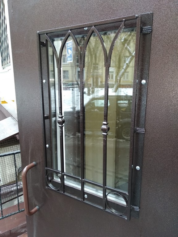 Металлическая дверь с ковкой и стеклом недорого в Видном